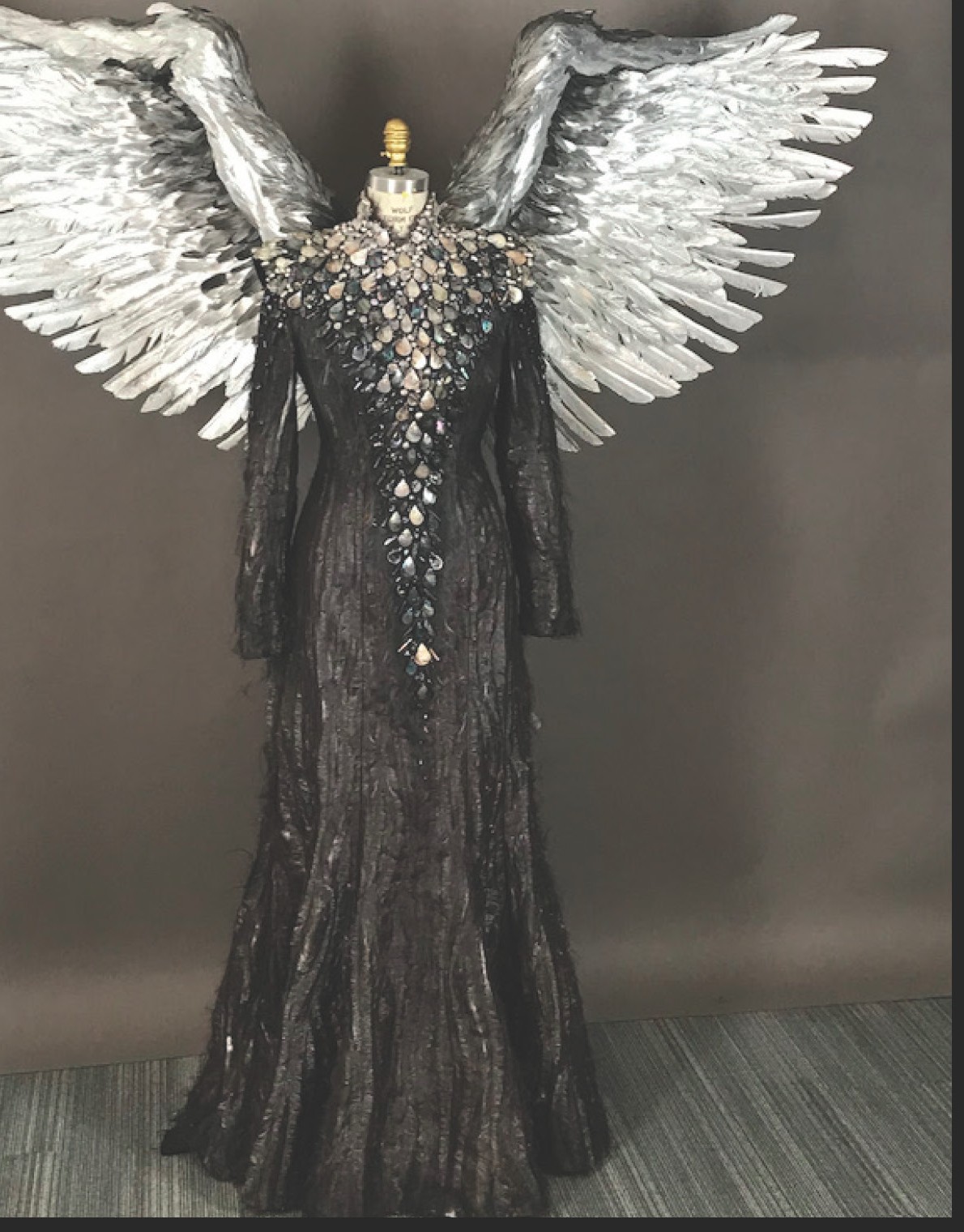 Metatron wing costume on mannequin